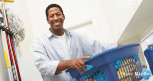 PristineCollars fabric spray displayed in a laundry room setting, highlighting its use as a collar stain prevention solution for shirts.